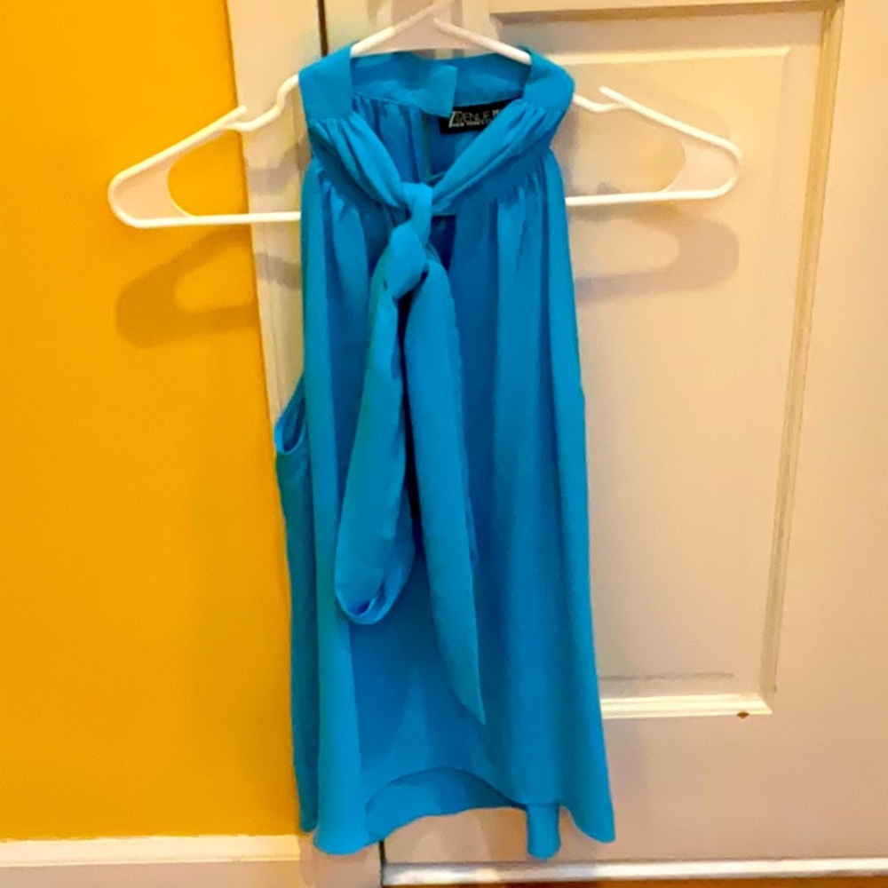 New York & Co light blue blouse with high neck  tie, size small.